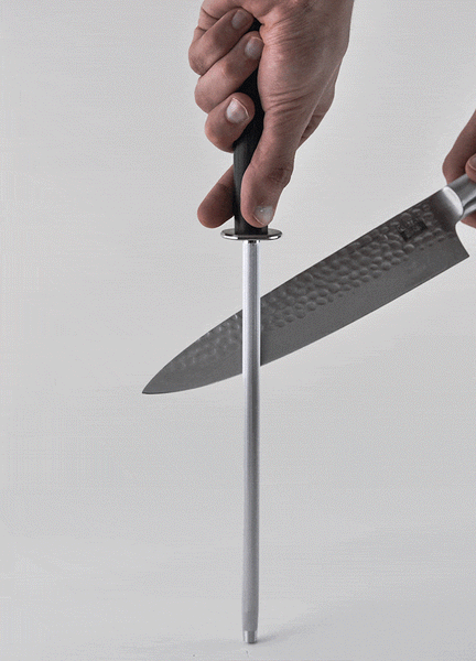 An animated GIF of how to hone a KOTAI knife, with a honing steel.
