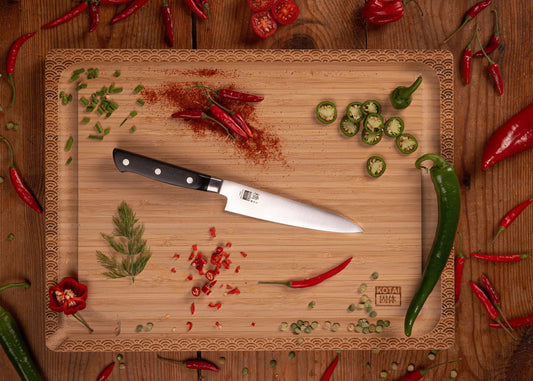 135 mm Hashi Classic Petty knife with molybdenum steel blade and black pakkawood handle.