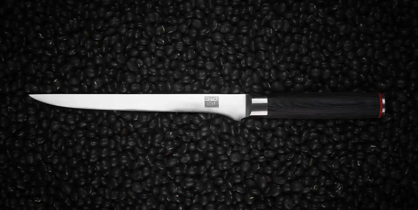 KOTAI's fish fillet knife displayed on a black background.