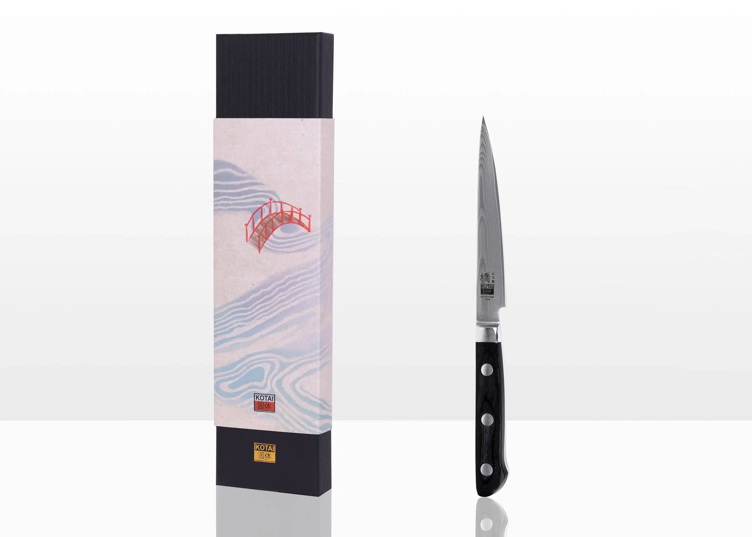 120 mm petty knife with MVS10Cob Damascus blade and pakkawood handle.