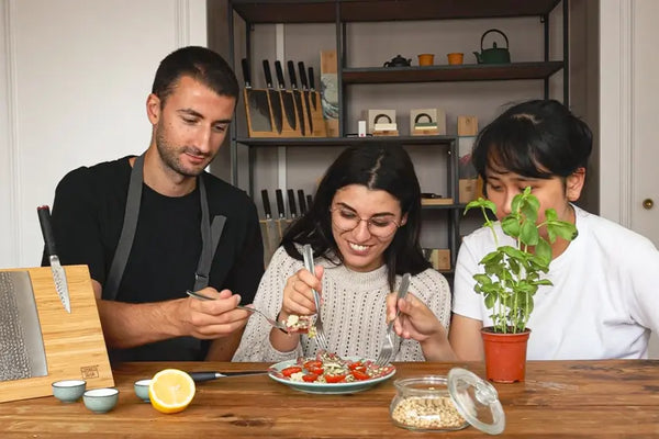 Smiling while eating a delicious homemade beef carpaccio.