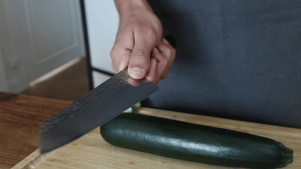 How to safely hold a kitchen knife.