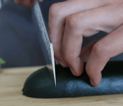 How to cut food without getting cut. How to position your fingers while cutting food.